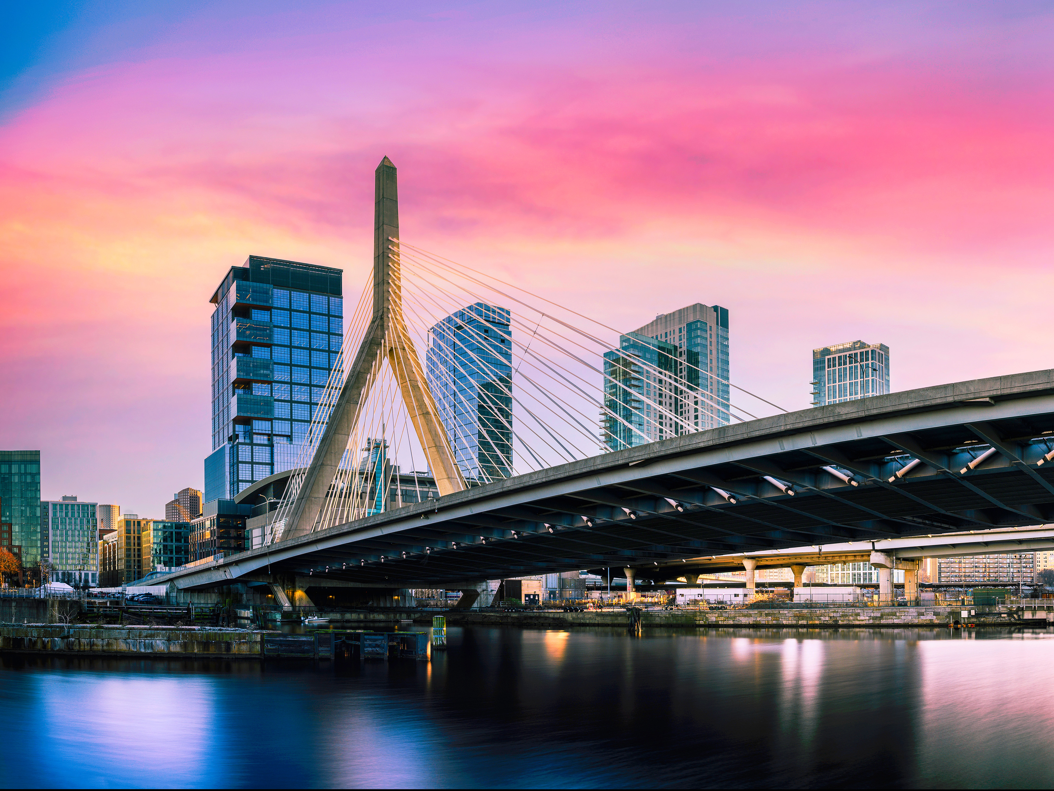 Photo of Zakim Bunker Hill Bridge in Boston against sunset