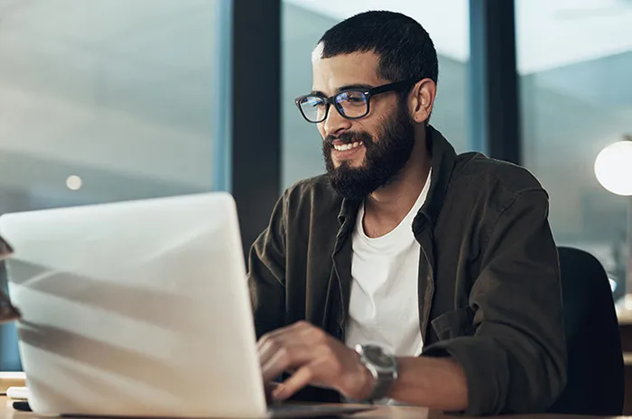 Person typing on a laptop